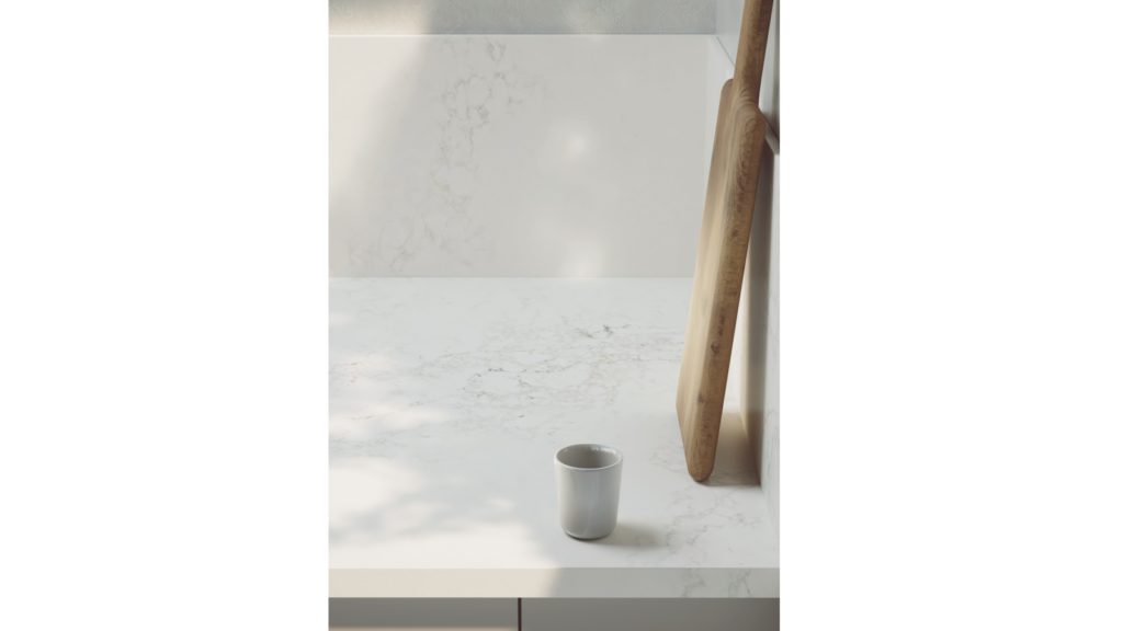 White worktop with chopping board and coffee