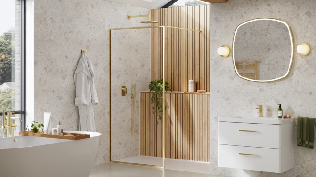 Brushed Brass walk-in shower enclosure next to anity and mirror